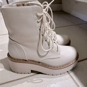 White combat boots.